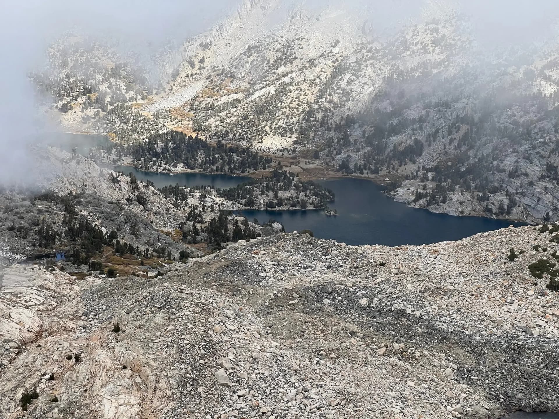 Rae Lakes peeking out from the cloud cover.