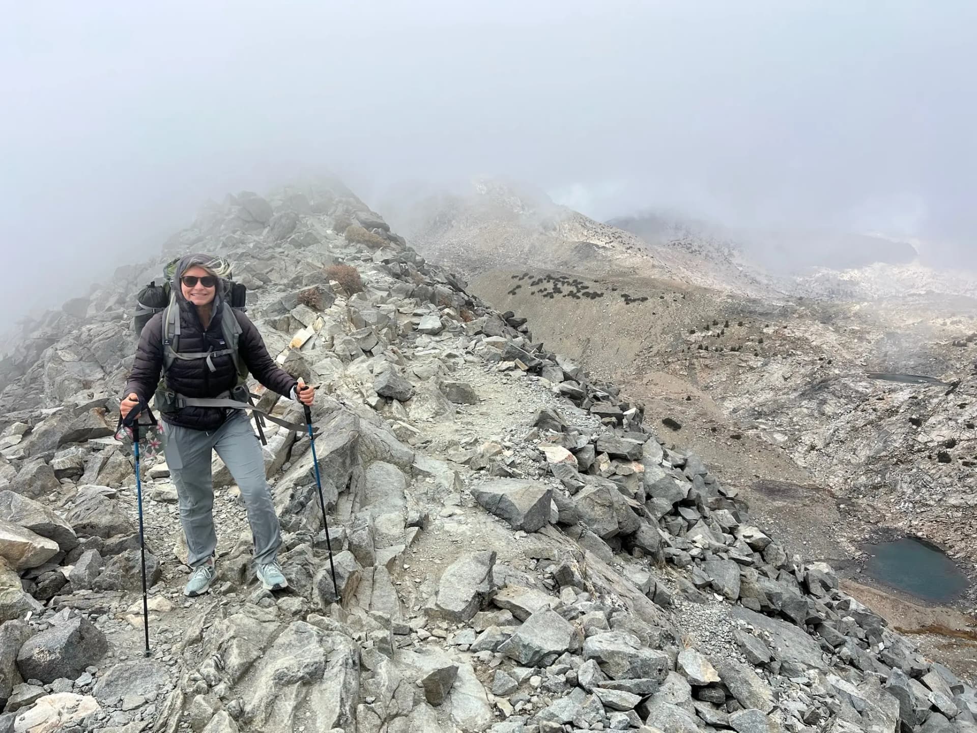 Cara at the top of Glen Pass. It's a knife blade thin pass!