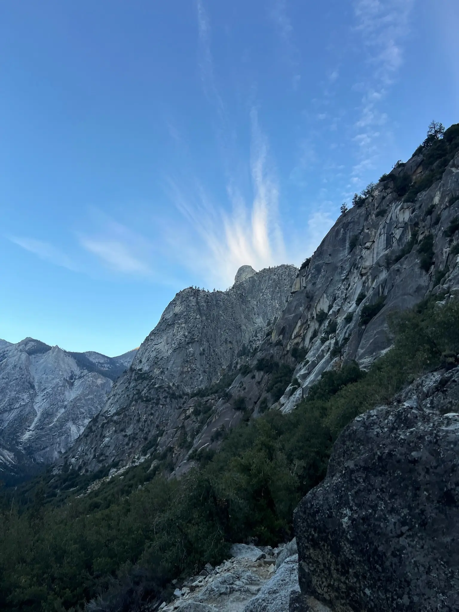 Wisps of cloud coming from the West.
