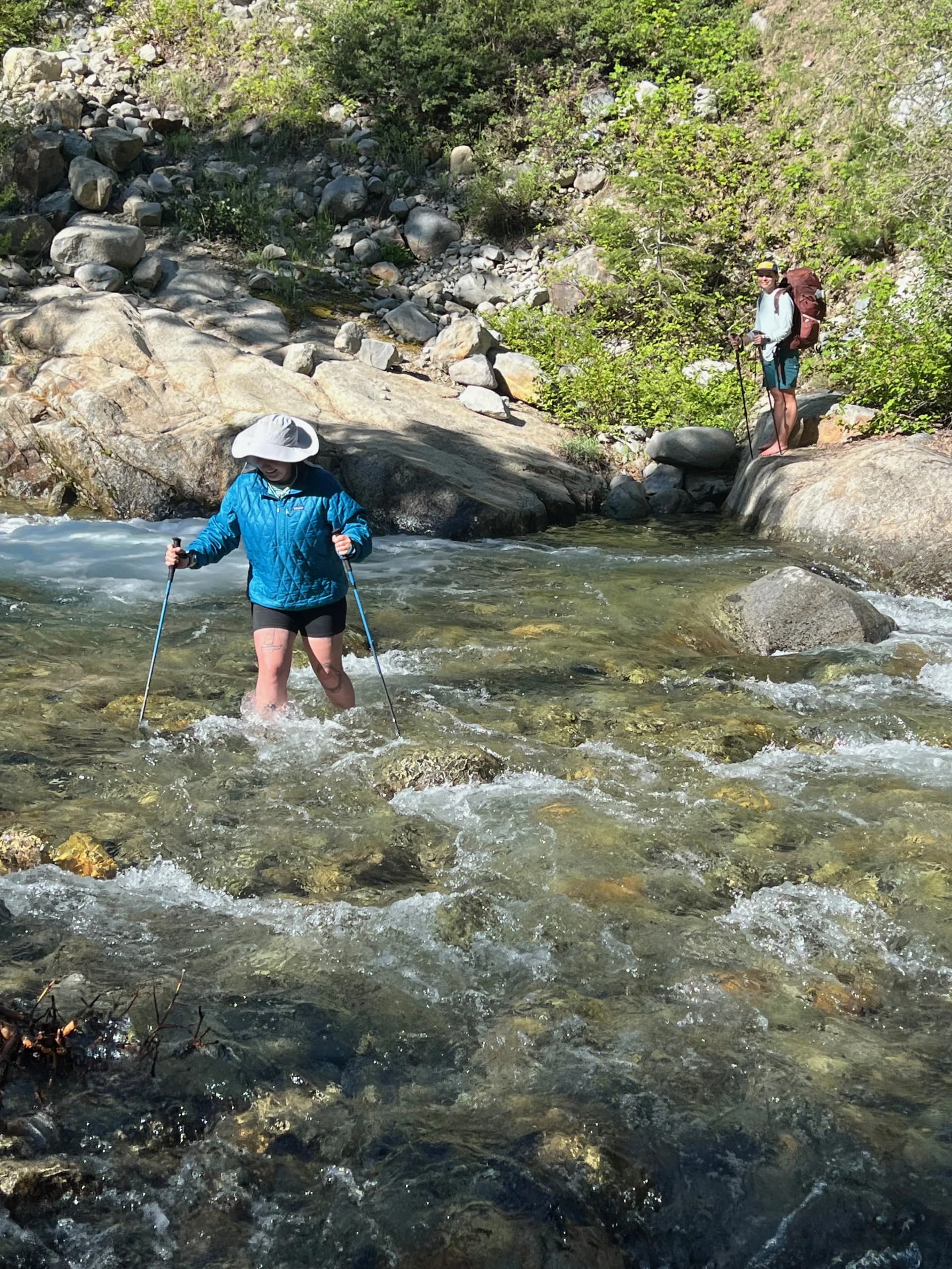 Sam and Reese begin crossing Cliff Creek